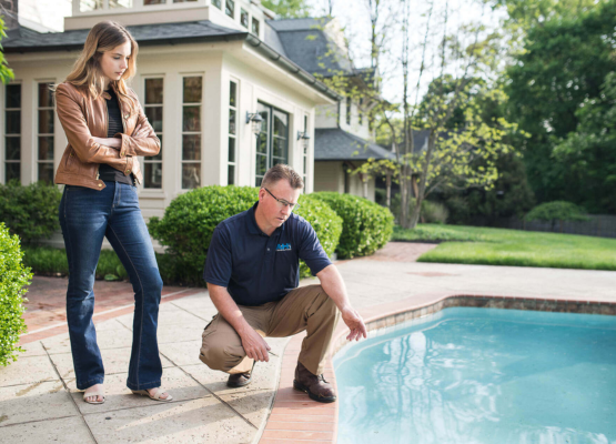 INSPECTION LOS ANGELES pool inspection specialist evaluating backyard pool condition